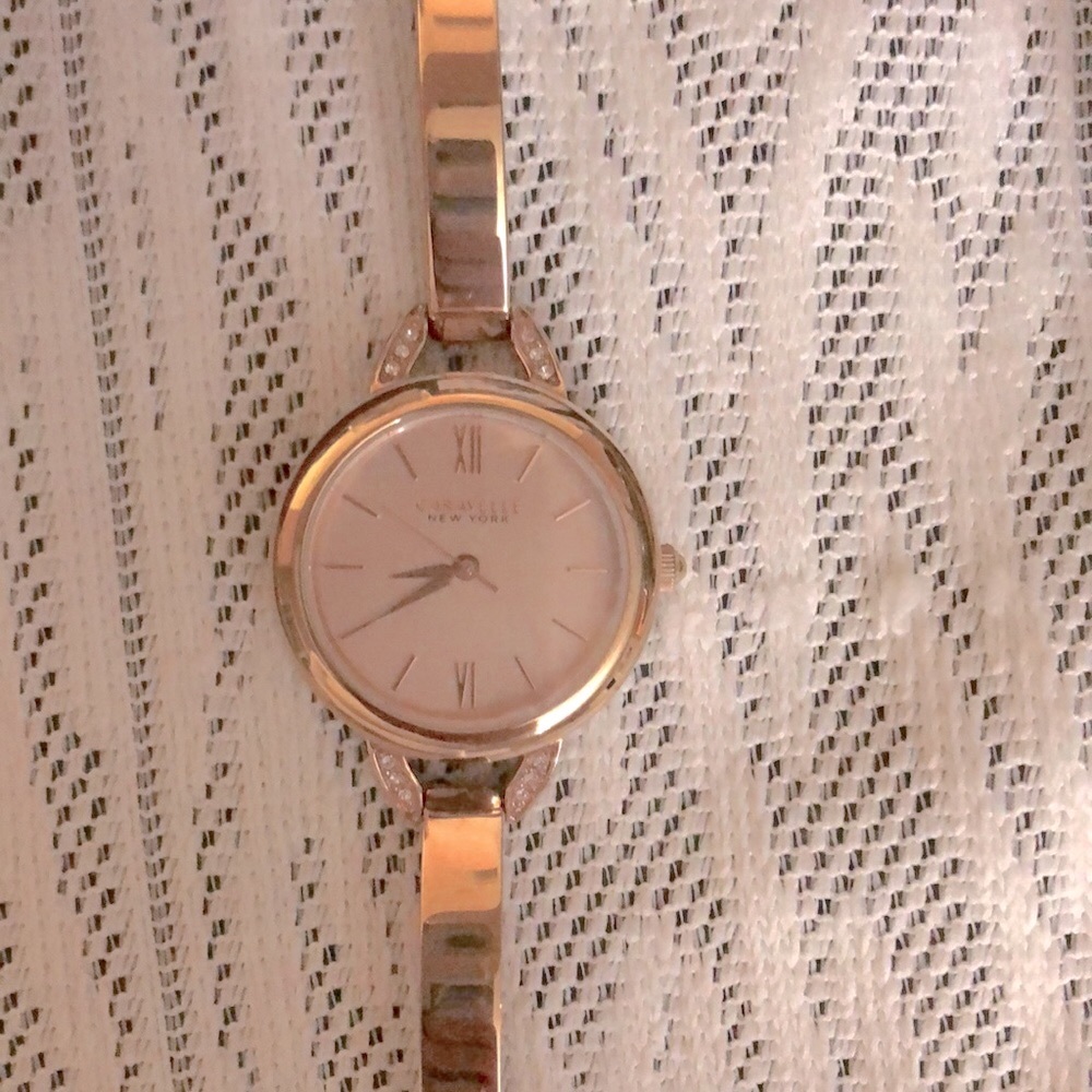 Round dial Caravelle New York rose gold wrist watch